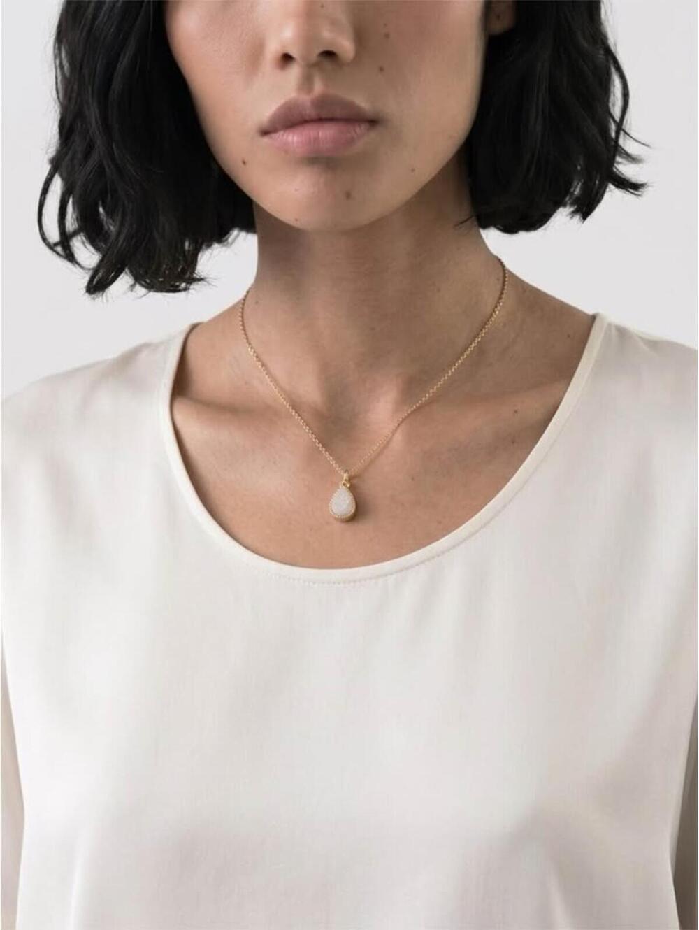Gold chain necklace with white teardrop pendant